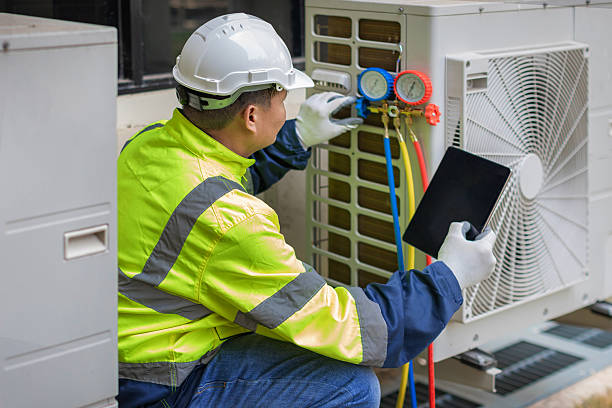 Professional Heat Pump Repair technician working in Hebron, OH